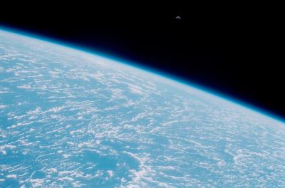 Photo of moon rise over the Earth taken from the Space Shuttle Discovery